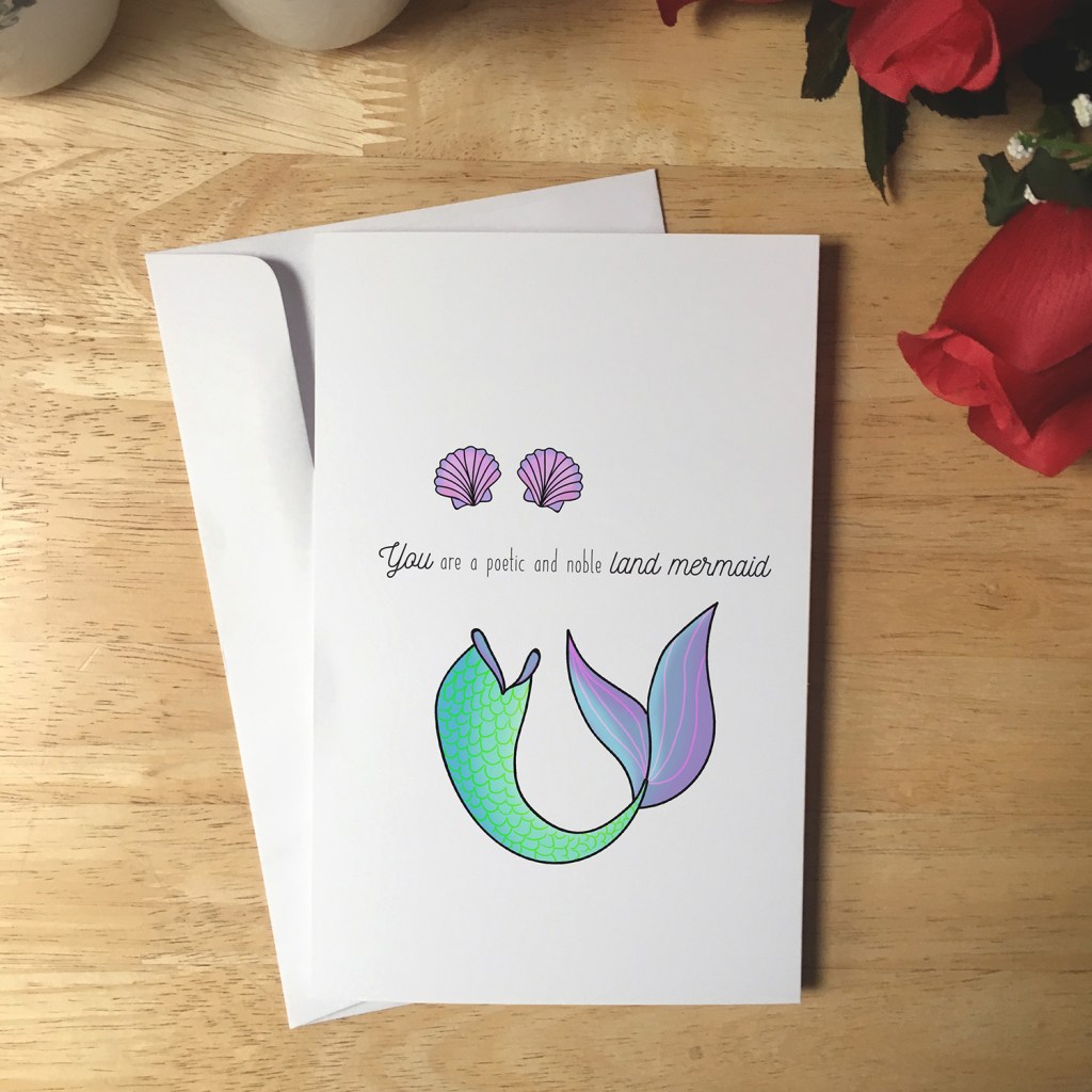 Greeting Card design of a mermaid tail and seashell bra. The text reads You are a poetic and noble land mermaid.