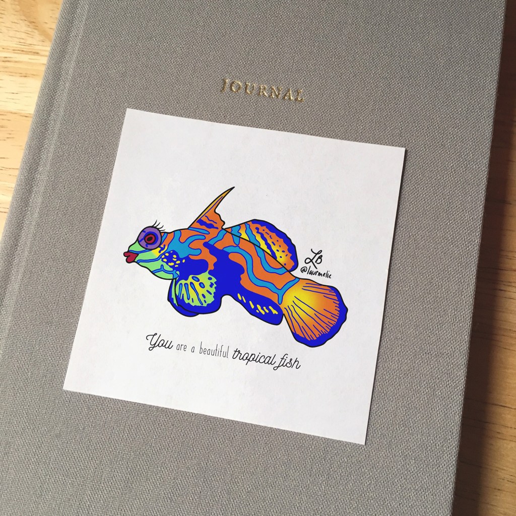 Sticker design with an illustration of a tropical fish that has red lipstick and eyelashes. The text reads You are a beautiful tropical fish.