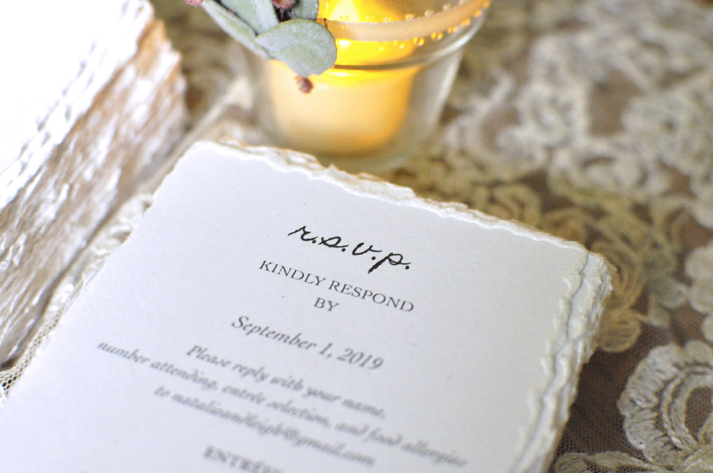 Stack of Reply Cards with black text on white paper.