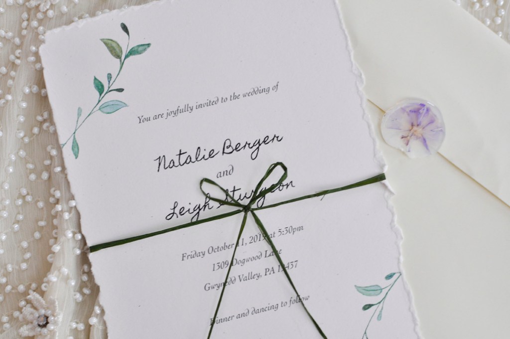 Wedding Invitation with green ribbon.