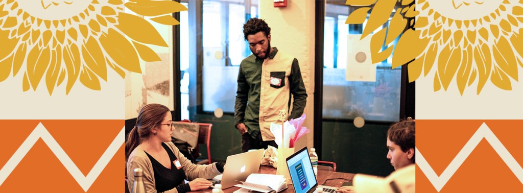 Image of Lauren Bryant and Urban Creator's Rob Sonder reviewing designs on a laptop.