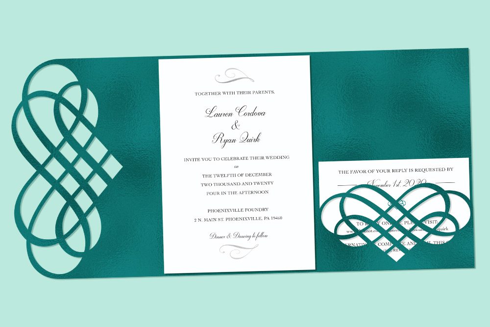 Wedding invitation design with teal foil heart embelishments